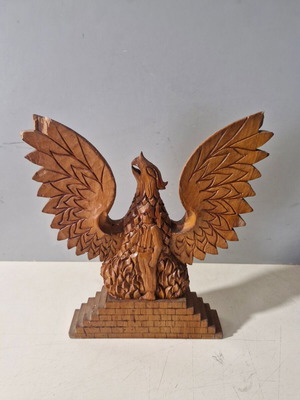 Wooden carved phoenix used from the seven-year service