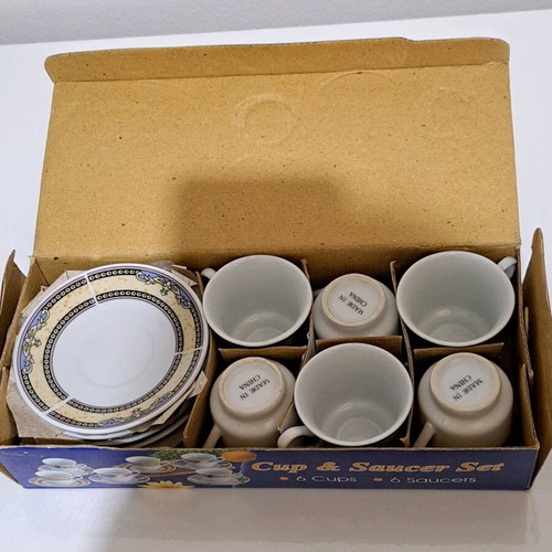 Set of 12 cups and saucers new