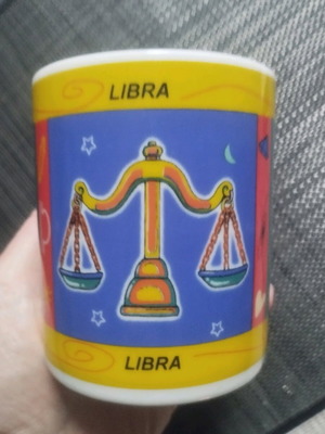 Porcelain mug with Libra zodiac theme like new