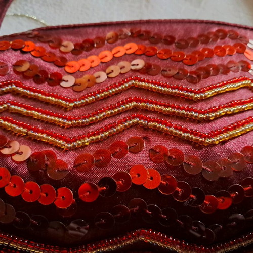 Evening satin handbag like new with burgundy sequins
