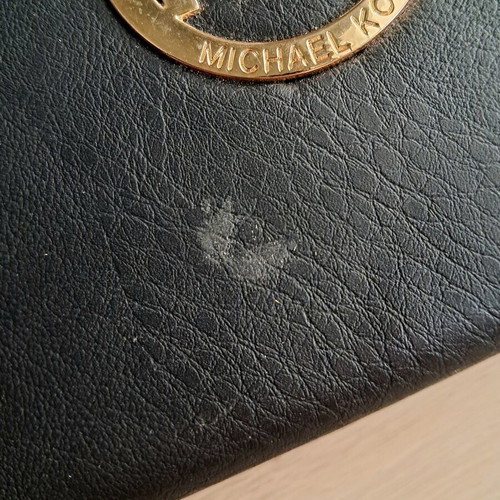 Michael Kors wallet used, black with gold monogram