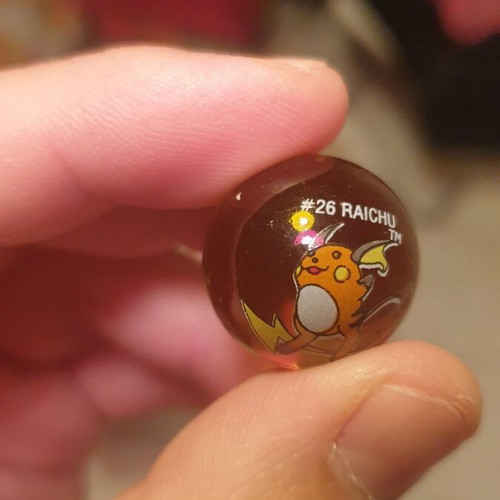 Raichu & Nidorino marbles like new, collectible