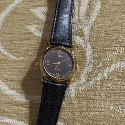 Cobra Quartz wristwatch used, black and gold