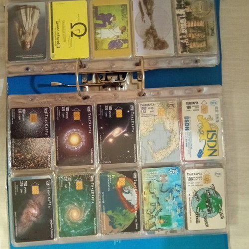 Phone cards used, collection of 240 in special sleeves with binder