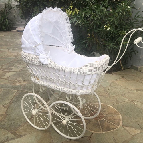 Doll pram used with white wicker basket