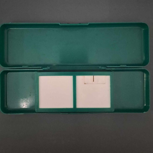 Collectible plastic pencil cases new, set of 2 green and purple