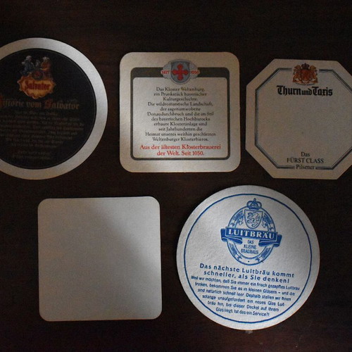 Coasters set of 5 very old, like new, from German and Japanese breweries