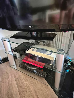 TV stand tempered glass with 3 shelves like new, minimal design