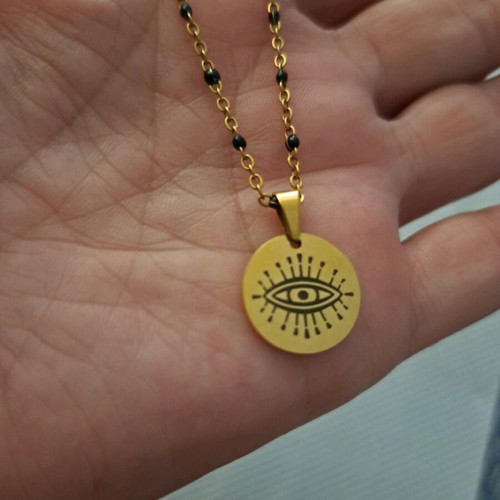 Eye necklace new, gold color, very special