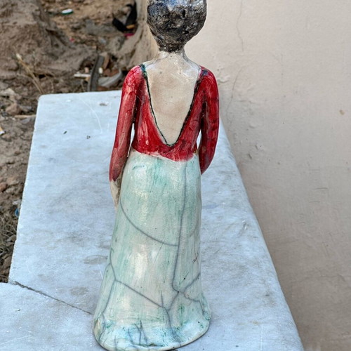 Handmade artistic ceramic woman statue used with rustic style