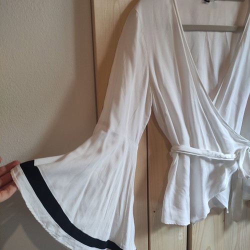 ALE white wrap blouse with bell sleeves, size M