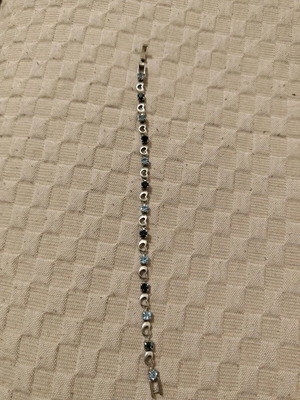 Silver bracelet with hearts and blue stones like new