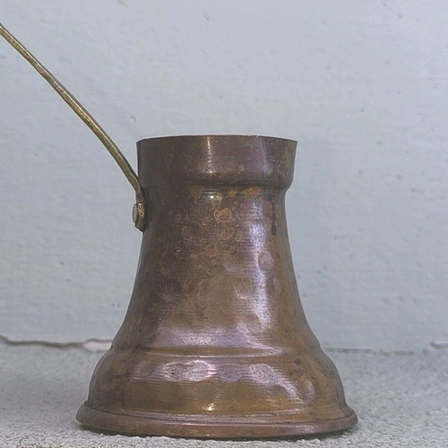 Handmade old copper briki for Greek or Turkish coffee used