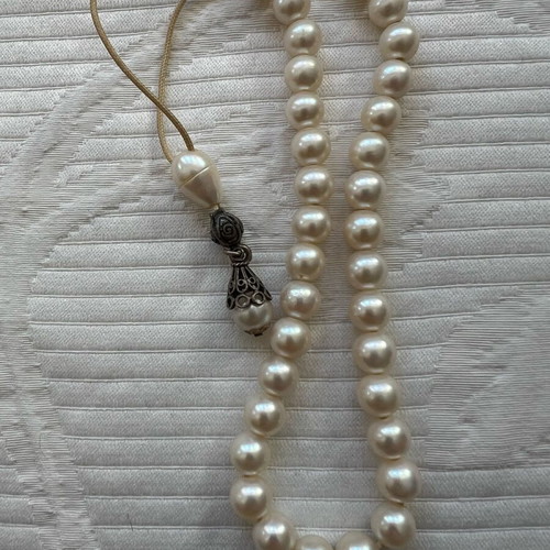 Worry beads made of artificial pearls like new