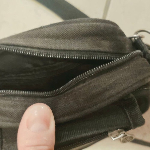 Men's black shoulder bag with multiple pockets