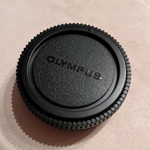 Olympus camera lens cap like new, unused