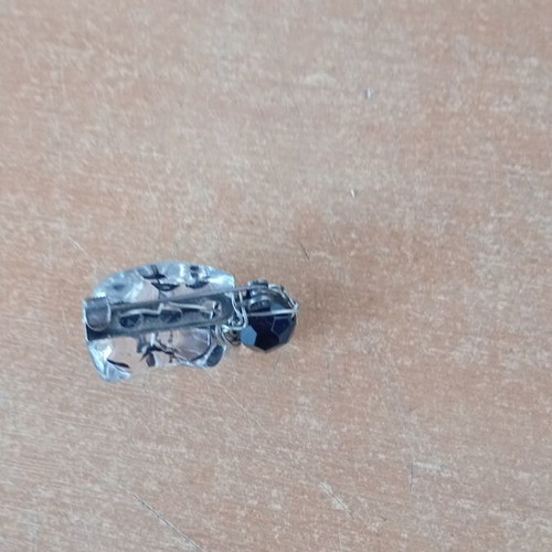 Transparent black beetle pin like new