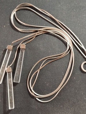 Tie necklace made of steel like new, silver color
