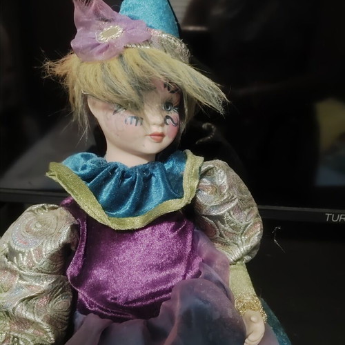 Harlequin porcelain music doll Symphony like new