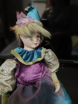 Harlequin porcelain music doll Symphony like new