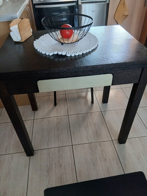 Extendable kitchen table used, black with silver drawer