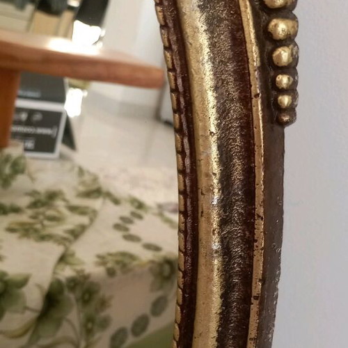 Oval bronze mirror used, antique style with gold paint
