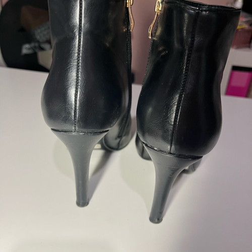 Migato black boots with 10 cm heel like new