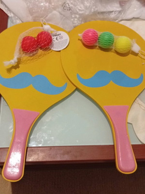 Wooden beach rackets set with colorful balls new