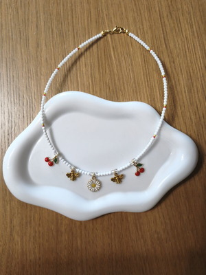 Handmade necklace with charms new, white and red