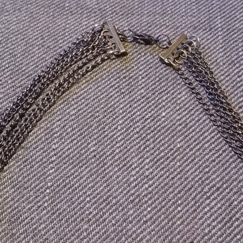 Fashion jewelry necklace in silver tones like new