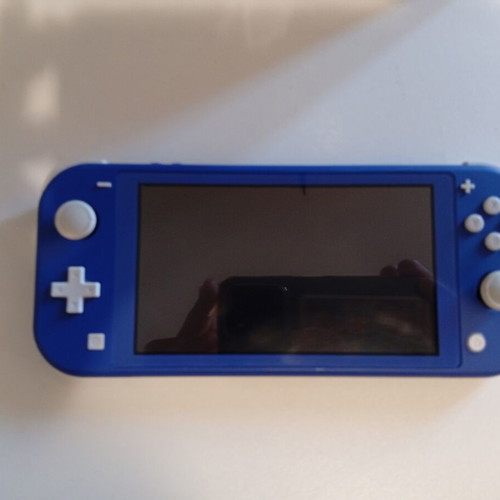 Nintendo Switch Lite like new with accessories, SD card, and game