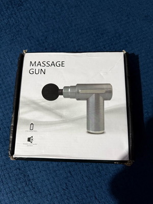 Massage Gun new with all accessories and charger