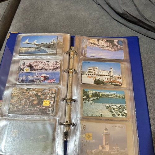 Album with 50 various phone cards like new