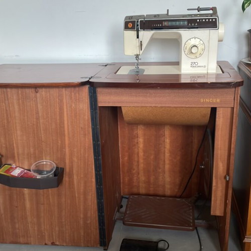 Singer electric sewing machine used, with cabinet