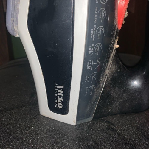 Ceramic steam iron used with steam and water outlets