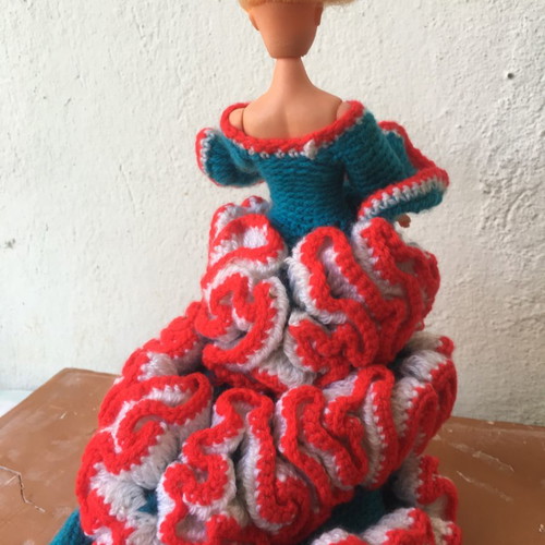 Spaniola doll with knitted dress and movable upper limbs
