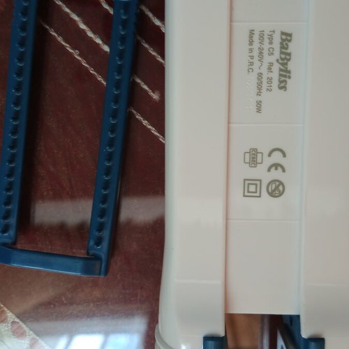 Hair straightener with water spray