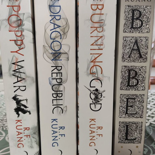R.F. Kuang book collection with Poppy War trilogy like new and lightly used Babel
