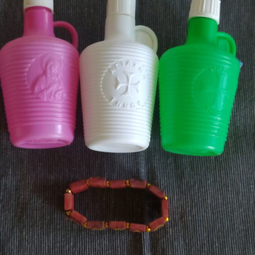 Bracelet with saints and holy water bottles pack used