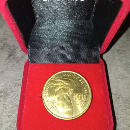 100 Drachma Coins like new, commemorating 1997 and 1999 World Championships