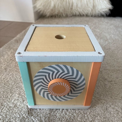Gerardo's wooden activity cube used