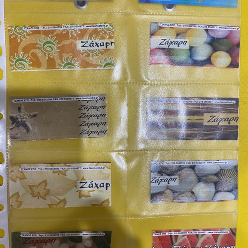 Sugar packet collection, 69 in holders plus 5 loose