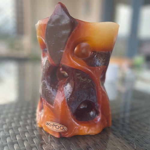 Handmade KHIROS candle like new, brown color with tealight holder