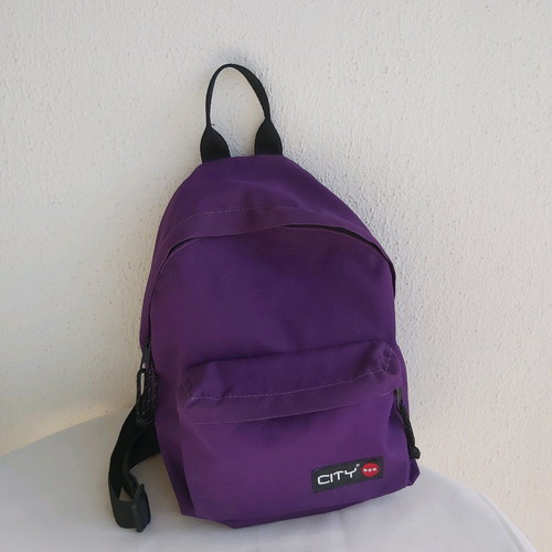 City backpack new, purple and black