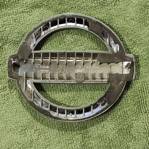 Nissan bakelite emblem for hood and trunk used