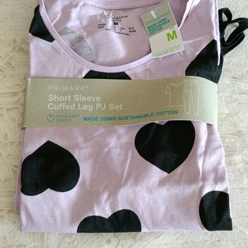 Primark pajama set with long pants and short sleeve top, size medium
