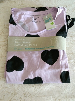 Primark pajama set with long pants and short sleeve top, size medium