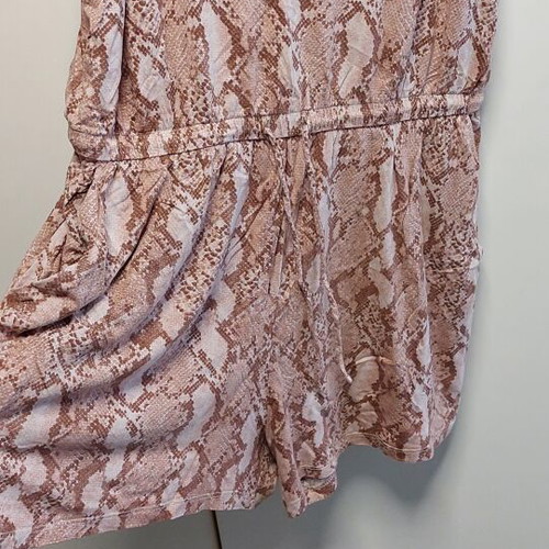 Summer one-piece H&M size M like new with front pockets and waist cord