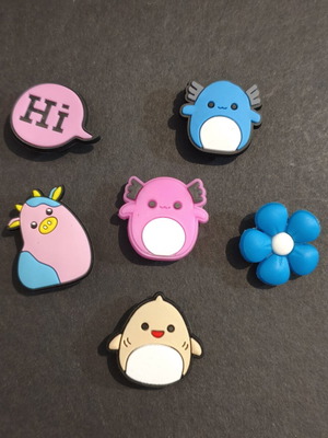 Crocs charms set like new, pink and turquoise