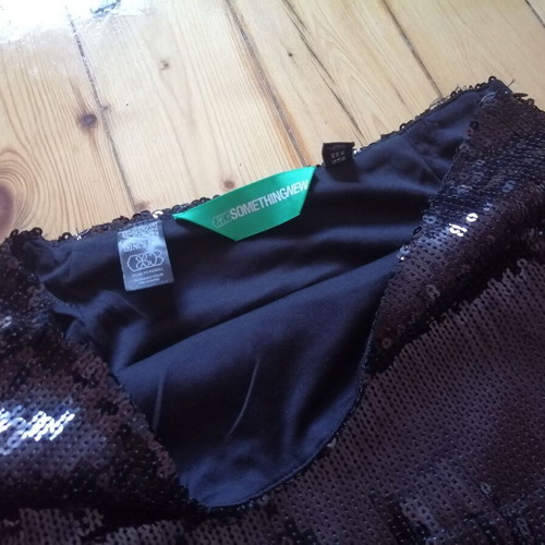 Something New women's black sequin skirt with fringes, XS-S